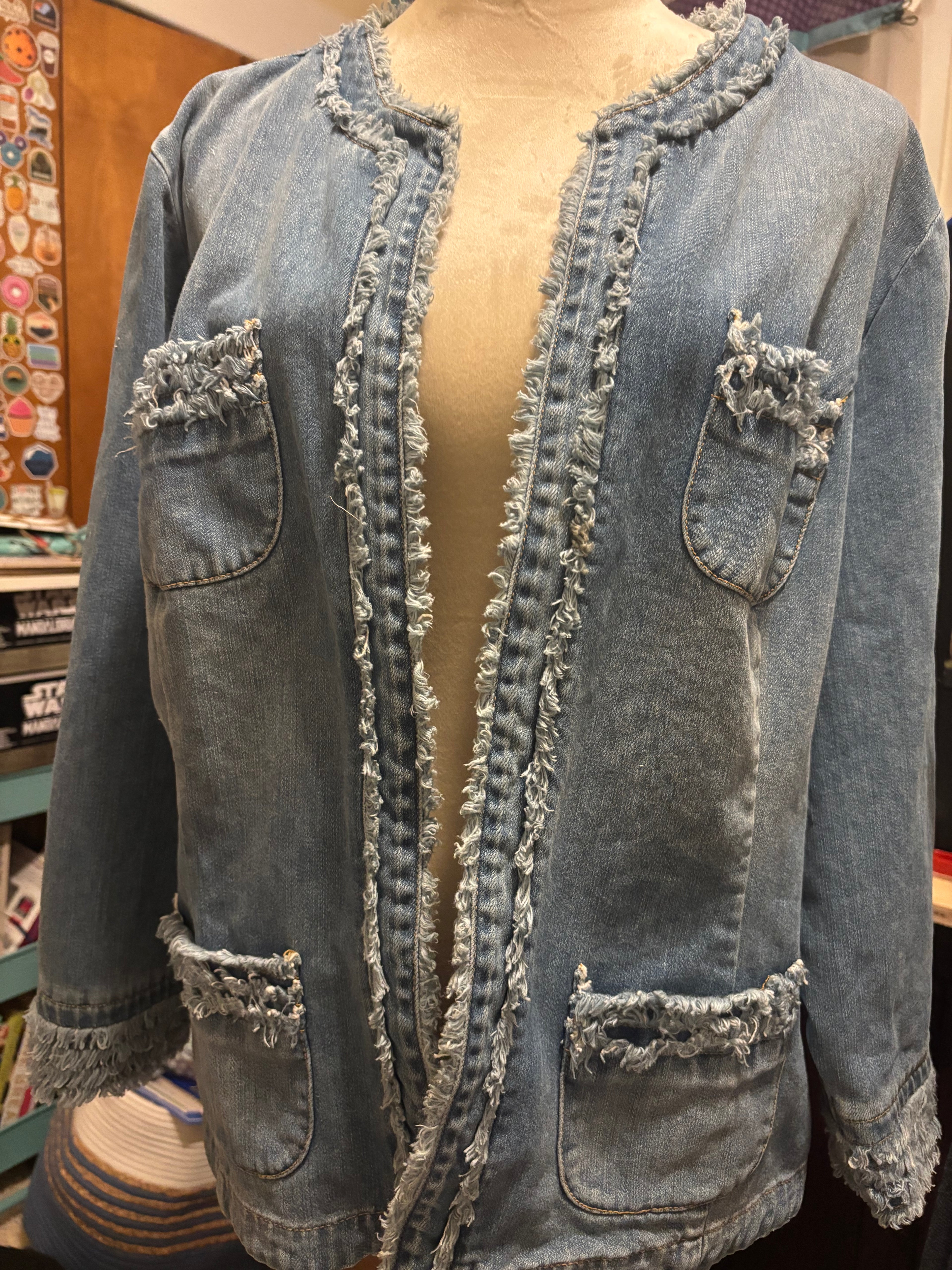 Beautiful upcycled denim jacket with quilted medallion on back. Size XL